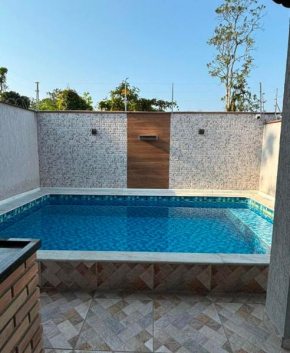 Casa piscina com cascata Guarujá Enseada